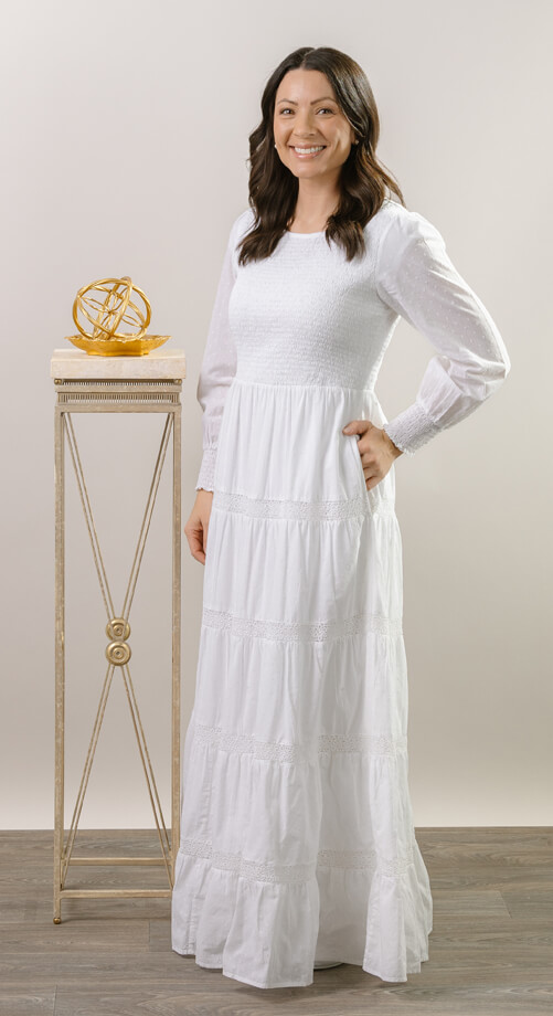 100% cotton shell with a light poly lining. LDS temple dress. Smocked top with a back zipper. 2 deep pockets.