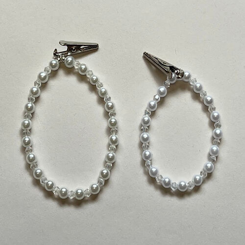 LDS Temple bracelet to hold name card. Stretch, lg and small. White pearl beads and crystals.