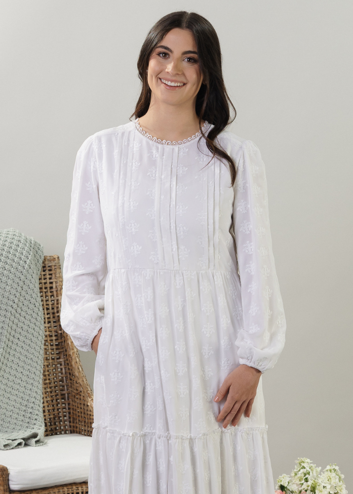 Woman wearing affordable LDS temple dress from White Elegance.